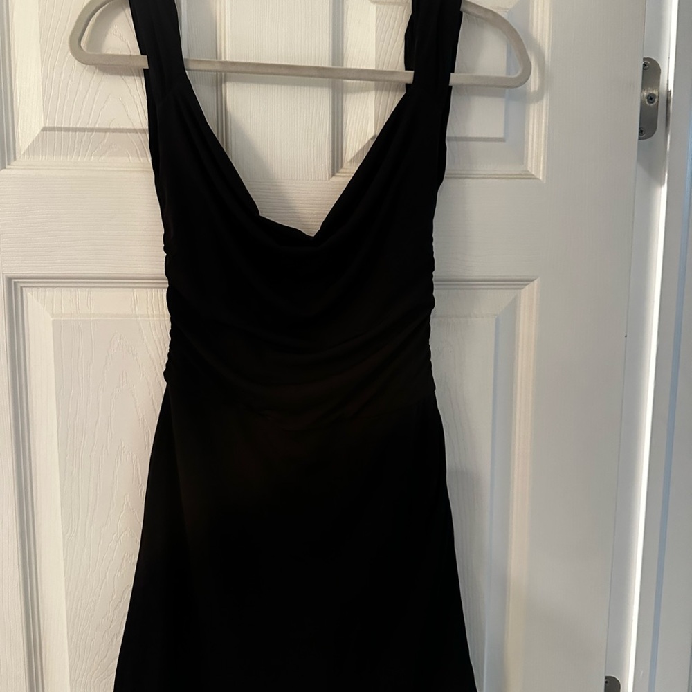 Size XS black mini dress from Hello Molly. New with tags.